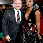Rian Johnson and Janelle Monáe on the red carpet of the Glass Onion premiere in Los Angeles